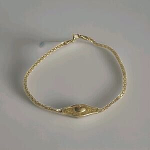 14kt Yellow Gold Link Bracelet Heart Centerpiece Textured Background 7.5" 2.2gr